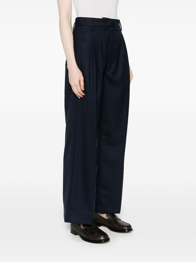 Pantaloni blu navy Tela