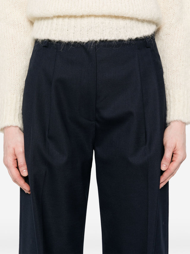 Pantaloni blu navy Tela