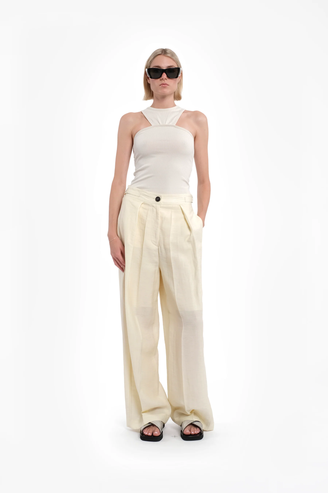 Pantaloni crema Tela
