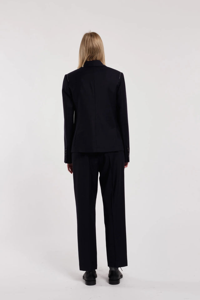 Pantaloni blu navy Tela